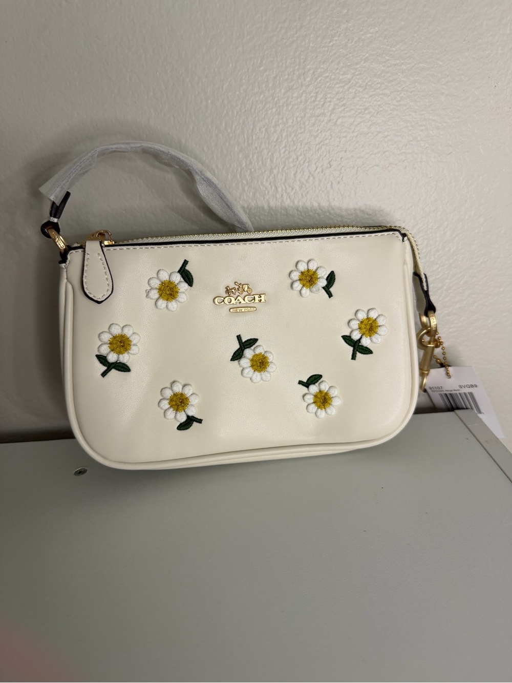 Coach Cream Leather Daisy Wristlet with Gold Hardware